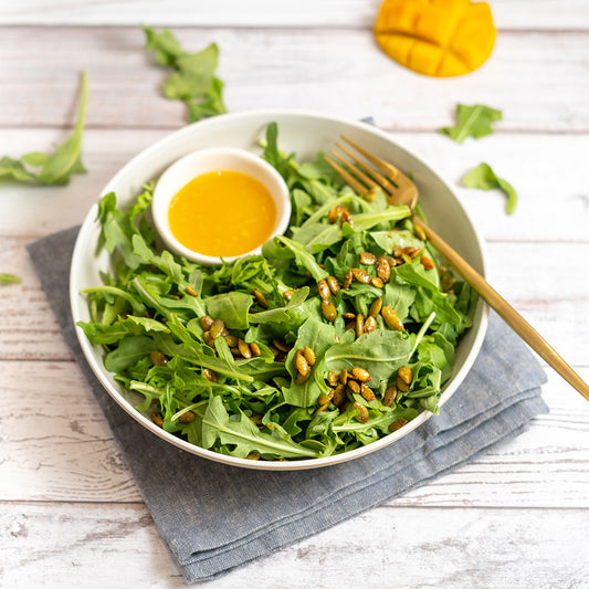 Arugula Salad with Spiced Pepitas and Mango Lime Vinaigrette