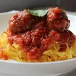 Turkey Pesto Meatballs and Homemade Marinara over Roasted Spaghetti Squash